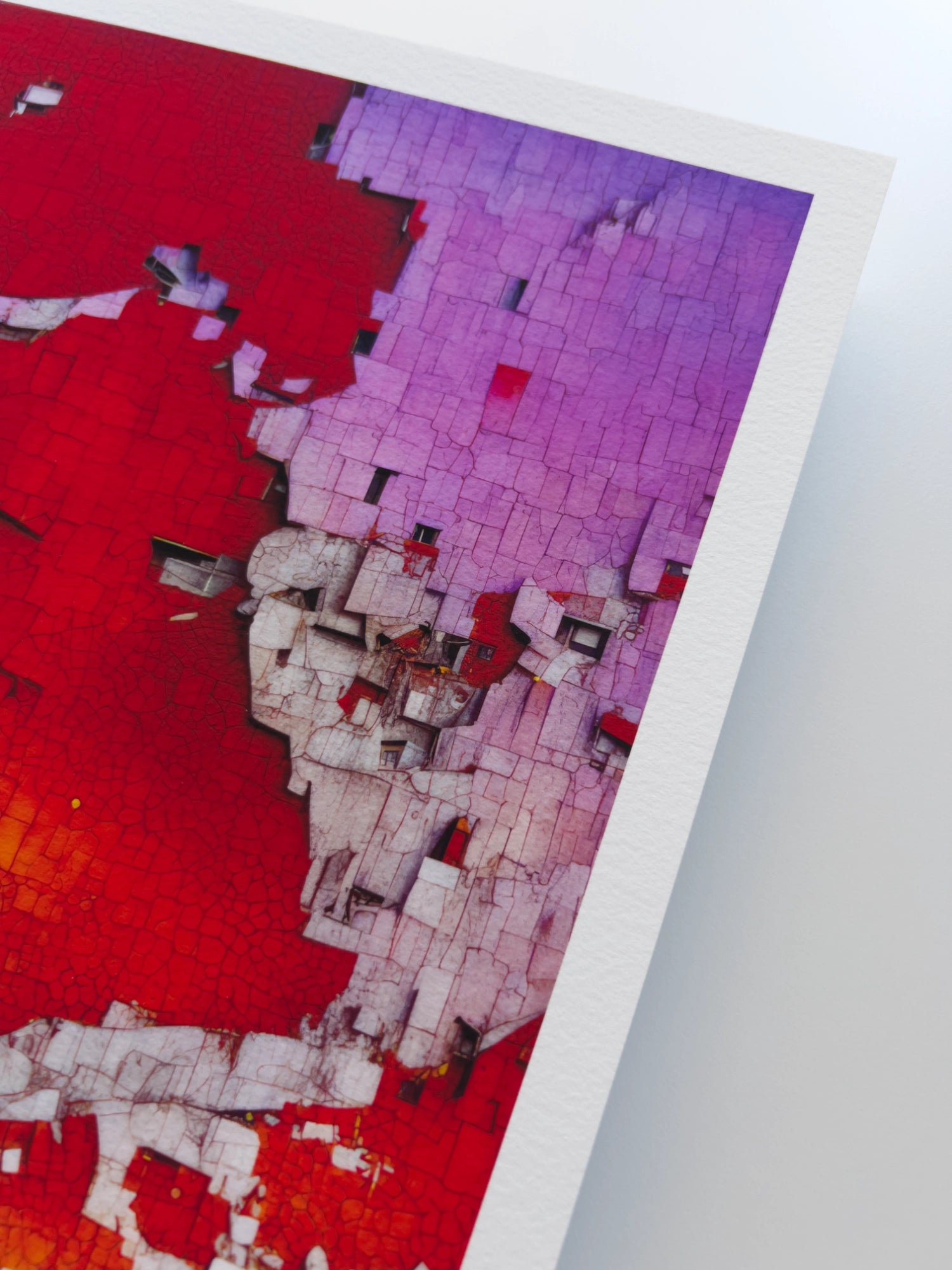A close up artwork detail of a vertical concrete urban landscape showered with purple evening sun against a deep red background colour.